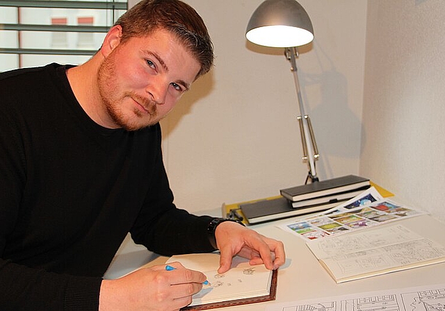 Comiczeichner Denis Klook bei der Arbeit an seinem Comic «Pummel» zu Hause in seinem Atelier in Olten. (Bild: mim) 
